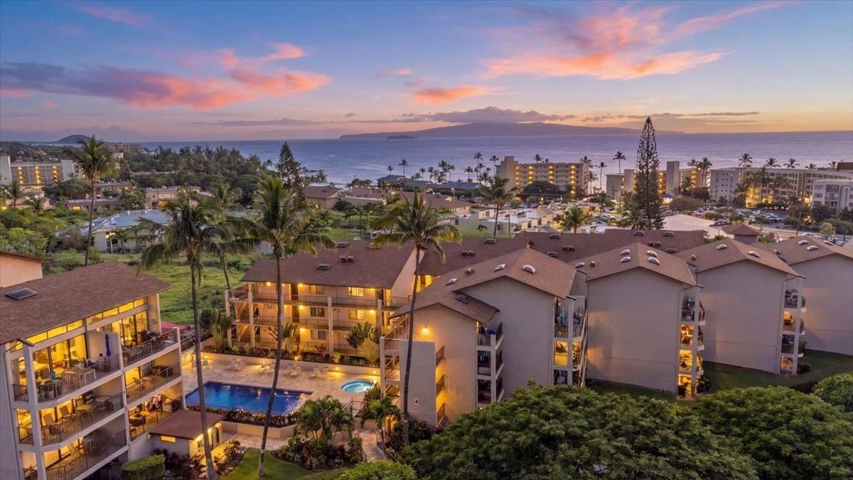 Kihei Alii Kai at sunset in Kihei, Maui, with the pool and the ocean beyond