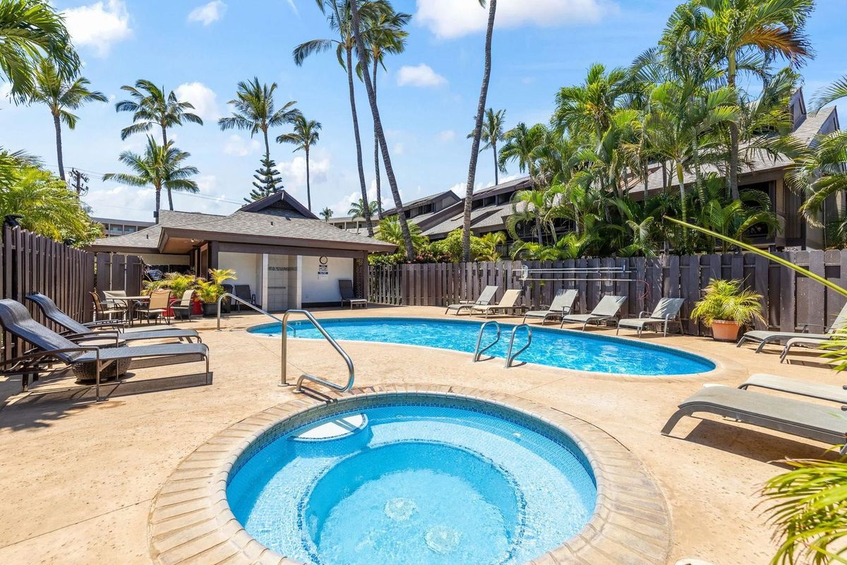 The pool and hot tub among the palms at Kihei Resort in Kihei, Maui